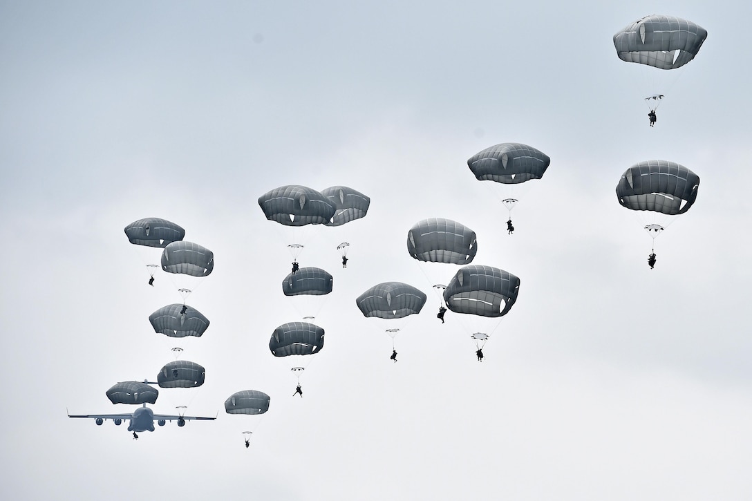 U.S., Italian and the British paratroopers participate in airborne operations during exercise Saber Junction 16 near Hohenfels, Germany, April 12, 2016. The U.S. paratroopers are assigned to the 173rd Airborne Brigade. Saber Junction 16 will evaluate and assess the readiness of U.S. soldiers to conduct land operations in a joint, combined environment and to promote interoperability with participating allied and partner nations. Army photo by Gertrud Zach