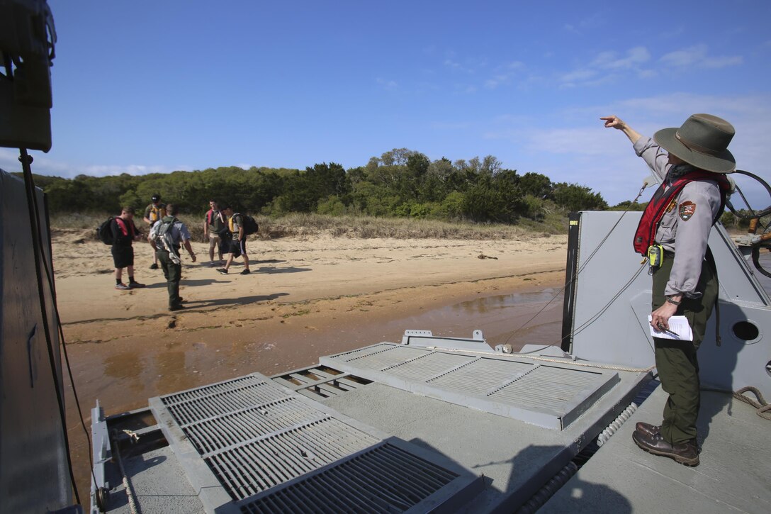 Members of the National Park Service dropped off the Marines of 2nd Radio Battalion and 2nd Law Enforcement Battalion across Shackleford Banks Island on April 21, 2016. The Marines picked up trash and debris to help the environment for the wild horses that inhabit the island. (U.S. Marine Corps photo by Lance Cpl. Miranda Faughn/Released)