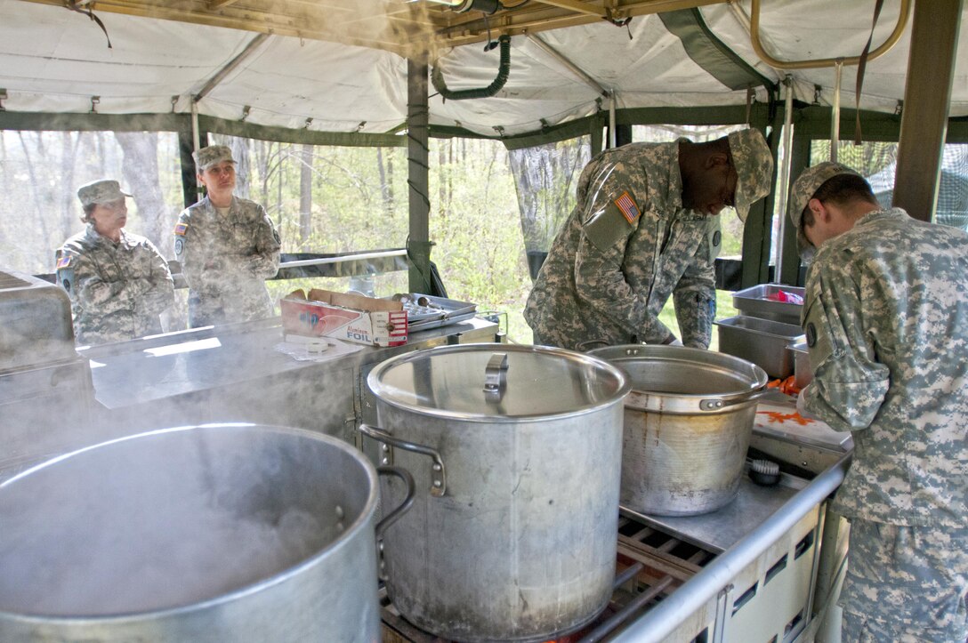 Food service specialists, of the 733rd Transportation Company, prepare lunch, while being graded by the U.S. Army Reserve food advisors, during the annual Philip A. Connelly Award competition at Fort Indiantown Gap, Pa., April 23, 2016. (U.S. Army photo by Staff Sgt. Dalton Smith / Released)