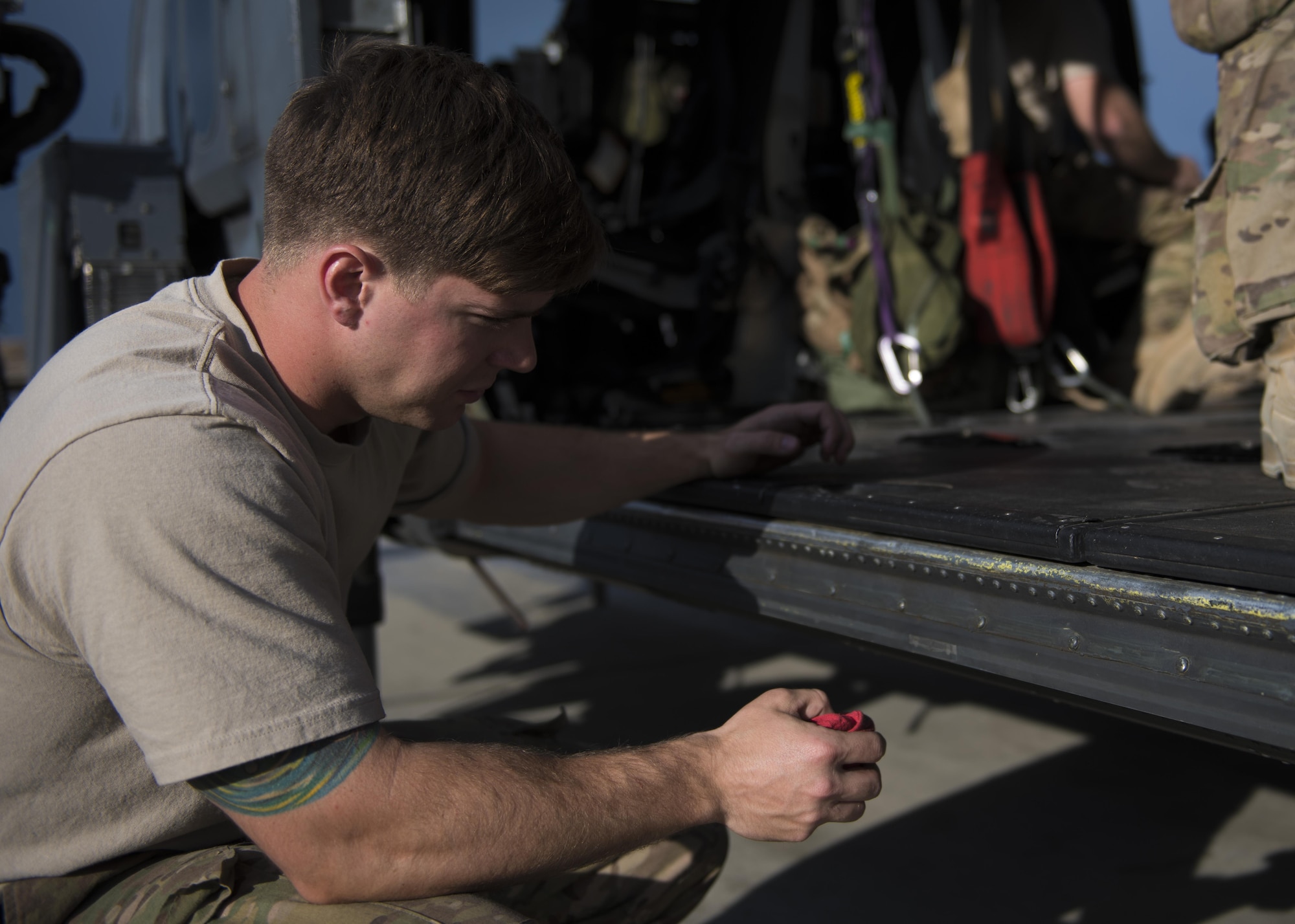 Senior Airman Thomas Crawford, 455th Expeditionary Aircraft Maintenance Squadron crew chief, conducts a pre-flight inspection for a HH-60G Pave Hawk before takeoff at Bagram Airfield, Afghanistan, April 25, 2016. The HH-60G is a derivative of the UH-60 Black Hawk and incorporates the US Air Force PAVE electronic systems program with its main mission to insert and recover personnel. (U.S. Air Force photo by Senior Airman Justyn M. Freeman)