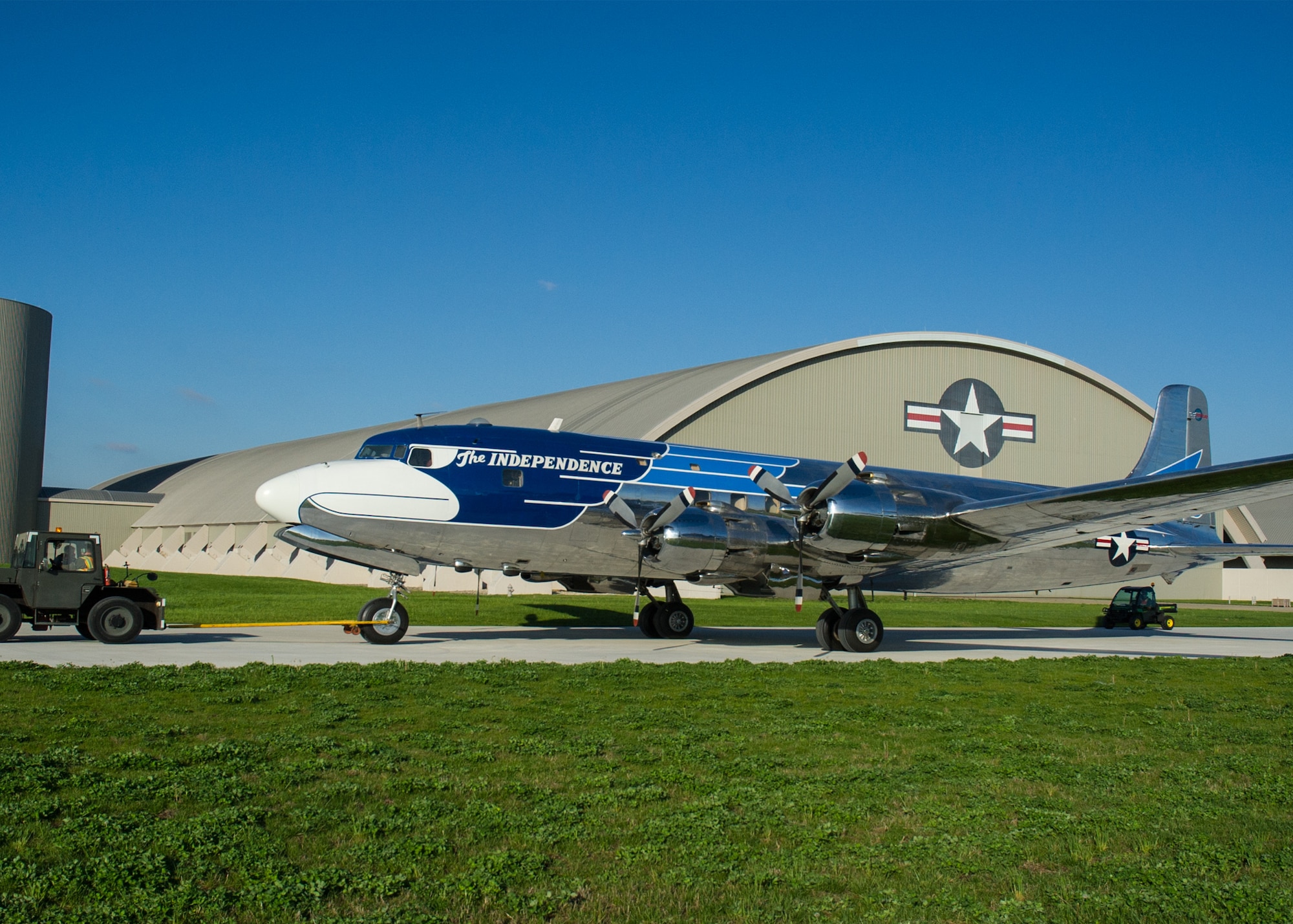 DAYTON, Ohio -- The Douglas VC-118 “Independence” being towed to the fourth building at the National Museum of the United States Air Force on April 23, 2016. This aircraft is one of ten Presidential aircraft in the collection. (U.S. Air Force photo by Ken LaRock) 