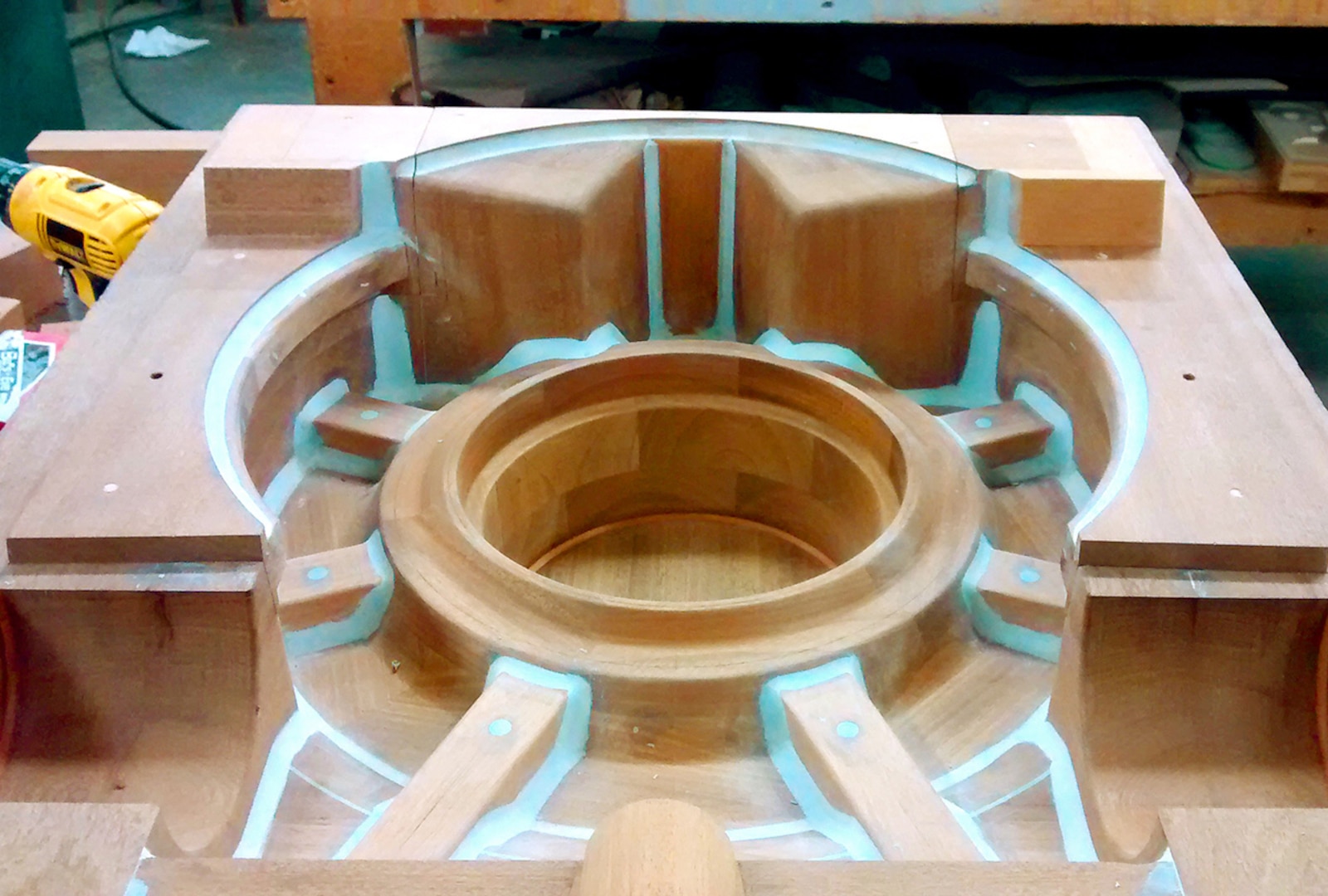 An old-fashioned casting pattern made of wood. Once a pattern is used to make a part, it is stored in a warehouse in case the foundry gets an order for the same part in the future.