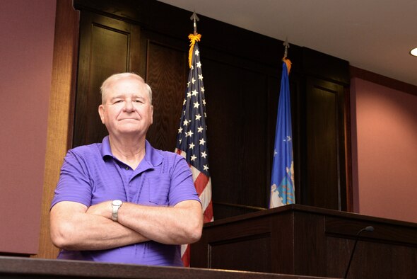 Jeffrey Dyer, 4th Fighter Wing Judge Advocate court reporter, stands at the court reporting position inside the 4th FW courtroom April 21, 2016. Dyer will retire April 29, 2016, following 45 years of service both as an active duty Airman and a civilian court reporter. (U.S. Air Force photo/Staff Sgt. Chuck Broadway)