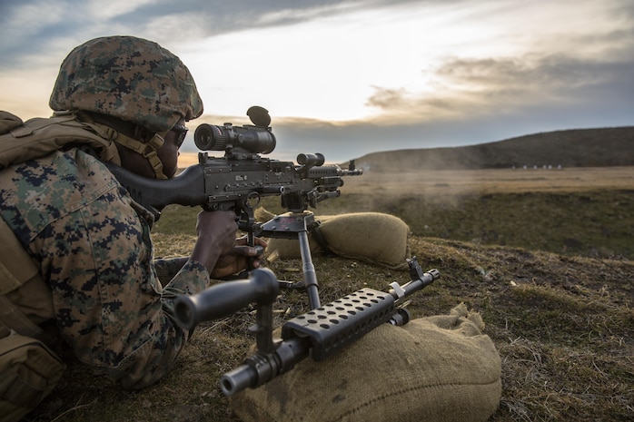 A U.S. Marine with Black Sea Rotational Force fires an M240B light machine gun during a live-fire exercise to confirm its zero aboard Mihail Kognalniceanu Air Base, Romania, Feb. 2, 2016. Marines from 1st Battalion, 8th Marine Regiment, conducted battle sight zeroes on various individual weapons systems, to prepare for future BSRF exercises and contingencies. (U.S. Marine Corps photo by Cpl. Kelly L. Street, 2D MARDIV COMCAM/Released)