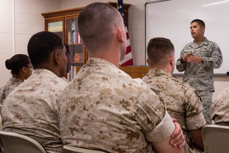 Tech. Sgt. Justin Villalpando, training noncommissioned officer in charge at Naval Consolidated Brig Miramar, teaches a portion of the Basic Brig Escort course aboard Marine Corps Air Station Miramar, Calif., April 19. The instructors with Naval Consolidated Brig Miramar certified 60 service members as basic escorts which will enable them to conduct prisoner escorts aboard MCAS Miramar and Marine Corps Base Camp Pendleton. (U.S. Marine Corps photo by Sgt. Lillian Stephens/Released)