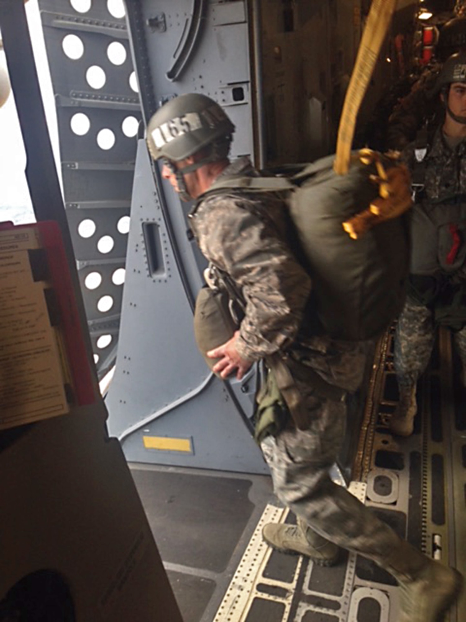 Lt. Col. John Robinson, 315th Operations Group deputy commander, jumps out of a Joint Base Charleston C-17 Globemaster III over Fryar Drop Zone at Fort Benning, Georgia when he attended the Army's Basic Airborne Course. For 15 years Robinson has been on the other end of the C-17 dropping Soldiers for the BAC, this time it was his brothers in the 701st Airlift Squadron were at the controls. (Courtesy photo)