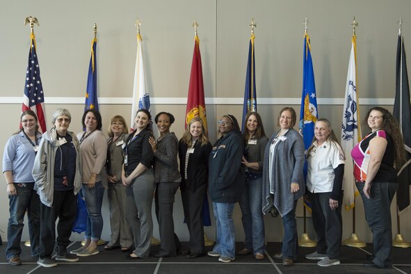 United States Navy veterans pose for a photo during the 2016 Indiana Woman Veterans’ Conference in Indianapolis, April 15, 2016. The event was held to bring awareness to Indiana women veterans and also provided a variety of workshops for attendees. (U.S. Air Force photo/Tech. Sgt. Benjamin Mota)