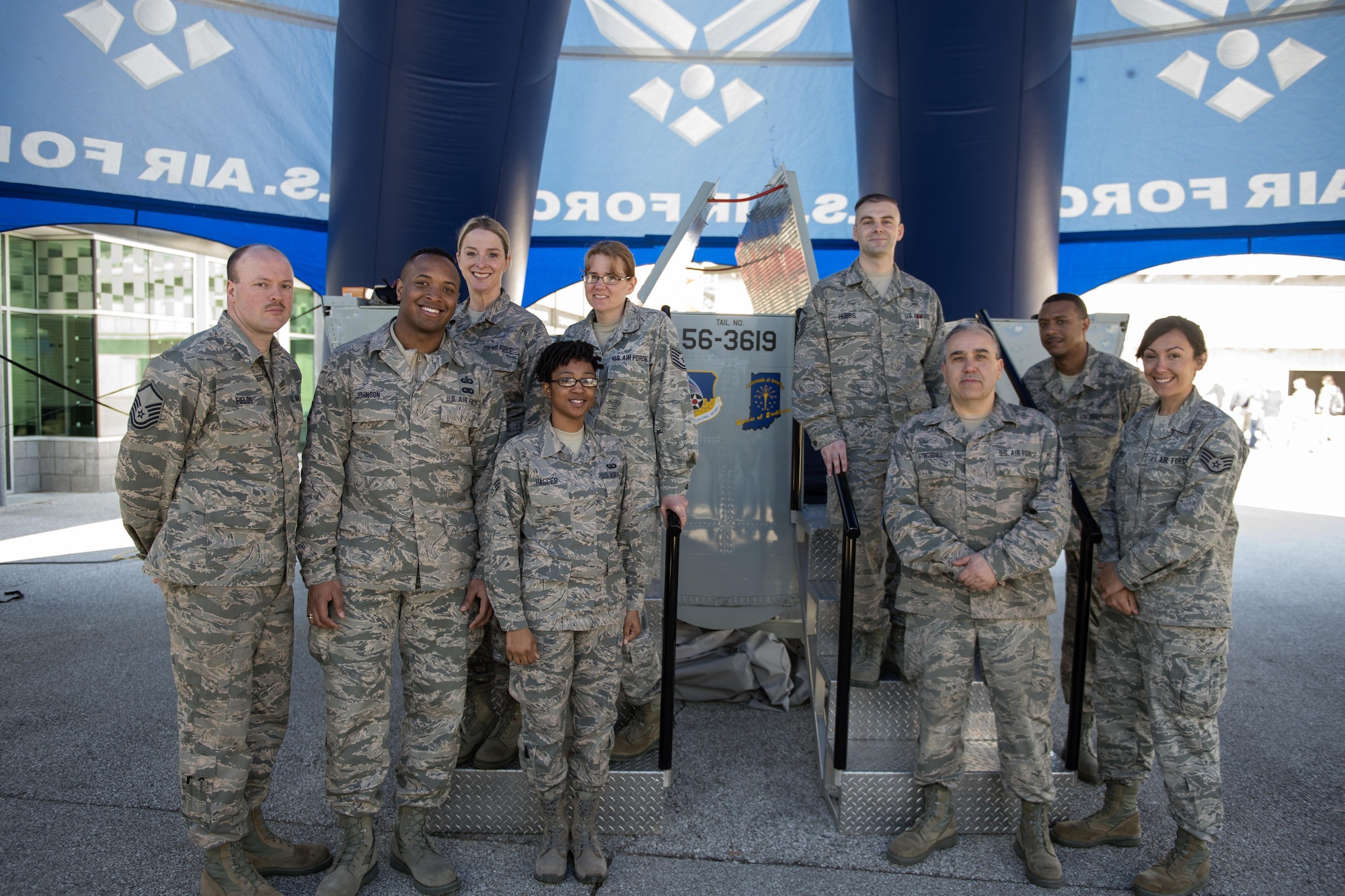 During the 2016 Indiana Woman Veterans’ Conference in Indianapolis, April 15, 2016 eight Airmen pose for a photo after setting upset Grissom’s interactive flight deck and boom pod displays. In the photo are:(first row left to right) Master Sgt. Corey Fields, 434th Maintenance Squadron structural maintenance supervisor; Staff Sgt. Bernard Johnson, 434th Air Refueling Wing reserve pay specialist; Senior Airman Monique Hagger, 434th ARW reserve pay specialist; Senior Master Sgt. Douglas Stogsdill, 434th MXS fabrications flight chief; Staff Sgt. Abigail Wakefield, 434th MXS nondestructive inspection specialist; (second row left to right) Master Sgt. Deborah Sweet, 434th MXG unit training specialist; Tech. Sgt. Cathleen Castleberry, 434th Maintenance Operations Flight plans and scheduling specialist; Master Sgt. Joseph Hubbs, 434th MOF production controller and Staff Sgt. Justin Simpkins, 434th ARW financial services specialist. (U.S. Air Force photo/Tech. Sgt. Benjamin Mota)
