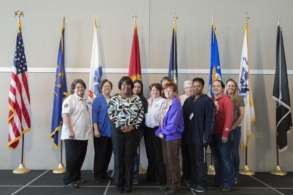 United States Marine veterans pose for a photo during the 2016 Indiana Woman Veterans’ Conference in Indianapolis, April 14, 2016. The event was held to bring awareness to Indiana women veterans and also provided a variety of workshops for attendees. (U.S. Air Force photo/Tech. Sgt. Benjamin Mota)