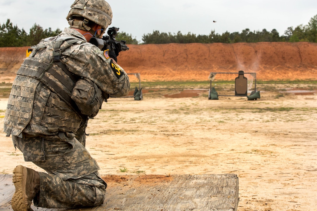 Army Staff Sgt. Michael Roggero fires at targets on the stress shoot range during Best Ranger Competition 2016 at Fort Benning, Ga., April 15, 2016. Roggero is assigned to the Airborne and Ranger Training Brigade. Army photo by Spc. Steven Hitchcock