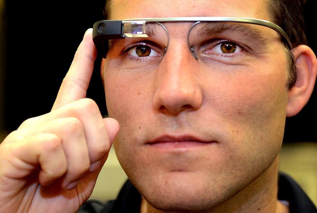 SAN DIEGO, (September 3, 2014) Dr. Joshua Kvavle, engineer, wearing Google's second version of Google Glass(2014). Dr. Kvavle along with his associates executed a small investigation into how Google Glass could be used in the Navy at the Space and Naval Warfare Systems Center Pacific. (Photo by Alan Antczak Released) 140903-N-YN244-002