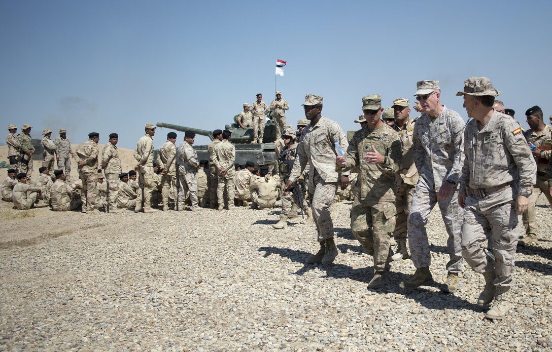 Marine Corps Gen. Joe Dunford, chairman of the Joint Chiefs of Staff, meets with trainers assigned to Combined Joint Task Force Operation Inherent Resolve at Besmaya Range Complex in Iraq, April 21, 2016. There are 3,782 Iraqi and peshmerga soldiers being trained at five sites across Iraq. Trainers come from the United States, Australia, Denmark, Finland, France, Germany, Hungary, Italy, Latvia, the Netherlands, New Zealand, Norway, Portugal, Spain and the United Kingdom. DoD Photo by Navy Petty Officer 2nd Class Dominique A. Pineiro
