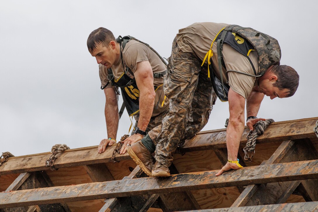 Army Rangers compete in a Spartan Race during Best Ranger Competition 2016 at Fort Benning, Ga., April 15, 2016. Army photo by Spc. Tracy McKithern