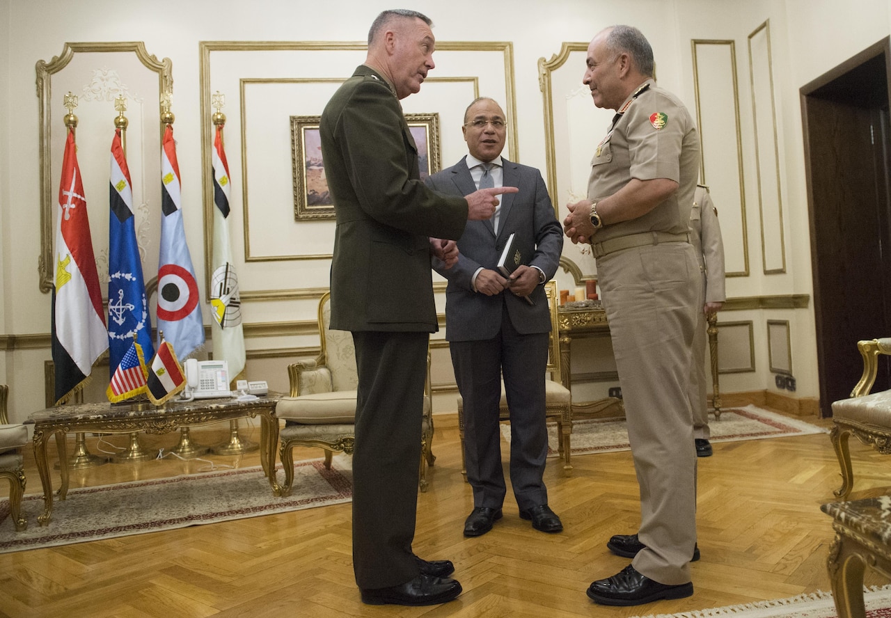 Marine Corps Gen. Joe Dunford, chairman of the Joint Chiefs of Staff, speaks to Egyptian Defense Chief Lt. Gen. Mahmoud Hegazy before a meeting with Sedki Sobhi, Egypt’s defense minister, at the Ministry of Defense in Cairo, Egypt’s capital city, April 23, 2016. Dunford traveled overseas to meet with military leaders and foreign dignitaries to discuss issues confronting the United States and its allies, including efforts to accelerate the lasting defeat of the Islamic State of Iraq and the Levant. DoD photo by Navy Petty Officer 2nd Class Dominique A. Pineiro
