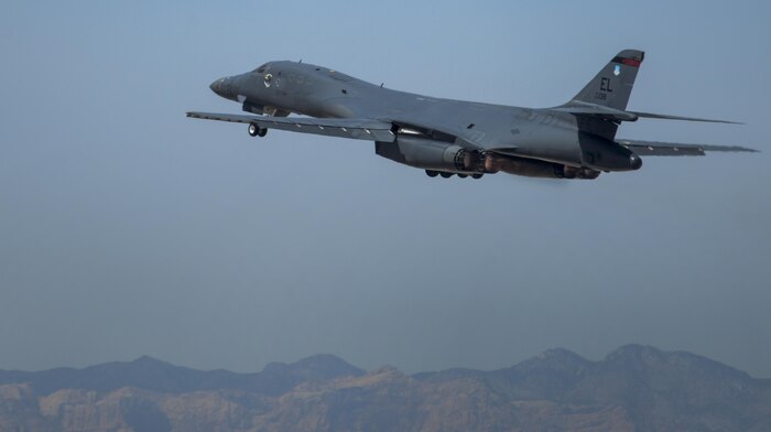A B-1B Lancer, assigned to the 34th Bomb Squadron, Ellsworth Air Force Base, South Dakota, takes off to head to training during Green Flag 16-05 at Nellis Air Force Base, Nev., April 21, 2016. Through the entire Green Flag, the 34th BS B-1s have prepared for the stresses of deployment and obtained valuable air-to-ground training in the process. (U.S. Air Force photo by Airman 1st Class Kevin Tanenbaum)