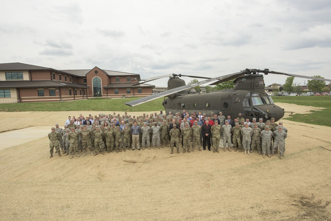 Soldiers and Civilians from the 11th Theater Aviation Command (TAC) along with Soldiers from the 19th Engineer Battalion celebrate the retirement and display of one of the 11th TAC’s CH-47 Chinook helicopters, Apr 21. The CH-47 Chinook was recently decommissioned and shipped to Fort Knox, Kentucky to be permanently displayed outside of the 11th TAC’s headquarters building. (Photo by Renee Rhodes / Fort Knox Visual Information)