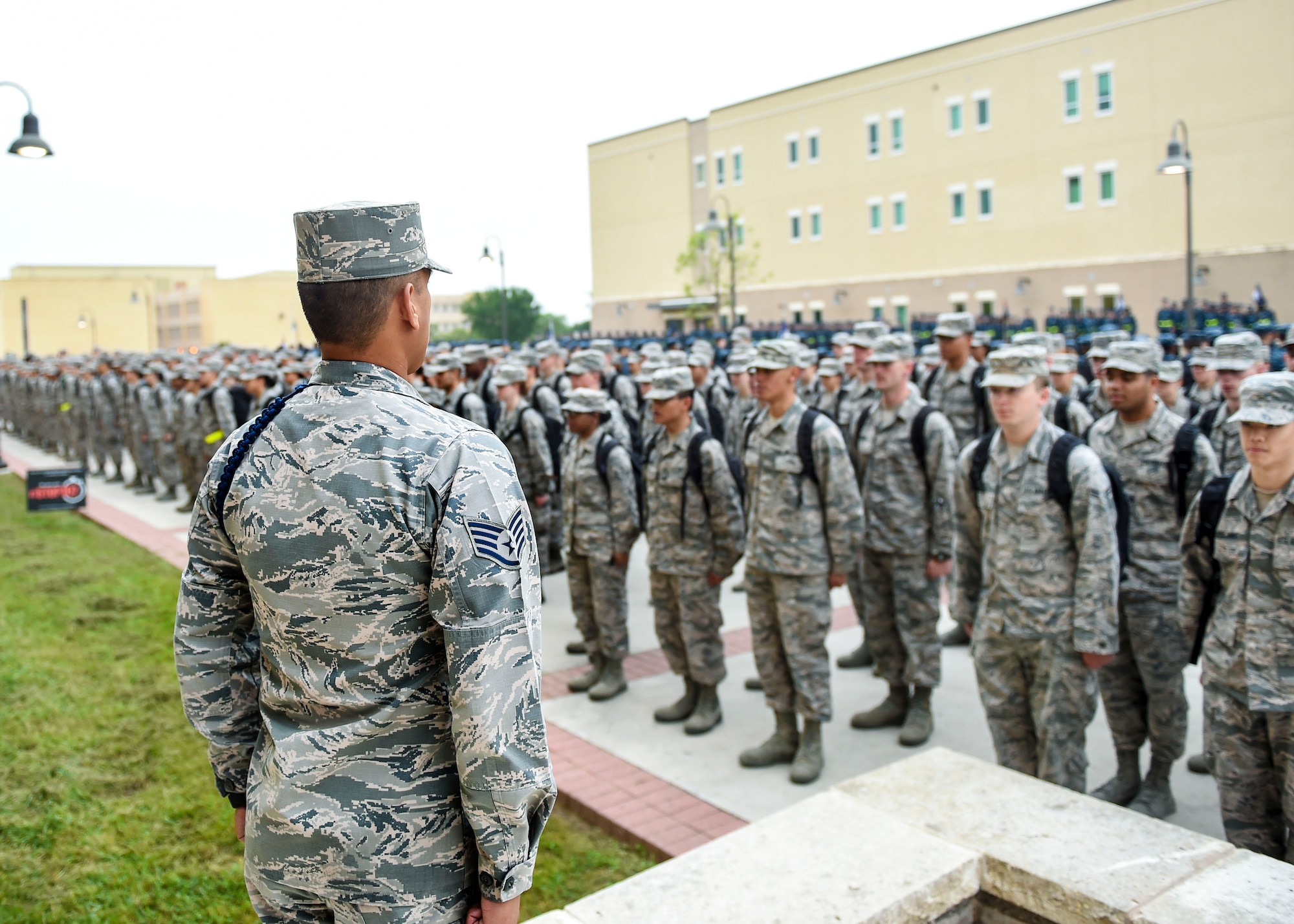 Prior to class, Staff Sgt. Mark Visita, 59th Training Group military training leader, leads technical training students in singing the Air Force song and reciting the Airman’s Creed April 14, 2016, on Joint Base San Antonio-Fort Sam Houston, Texas. (U.S. Air Force photo/Staff Sgt. Michael Ellis) 