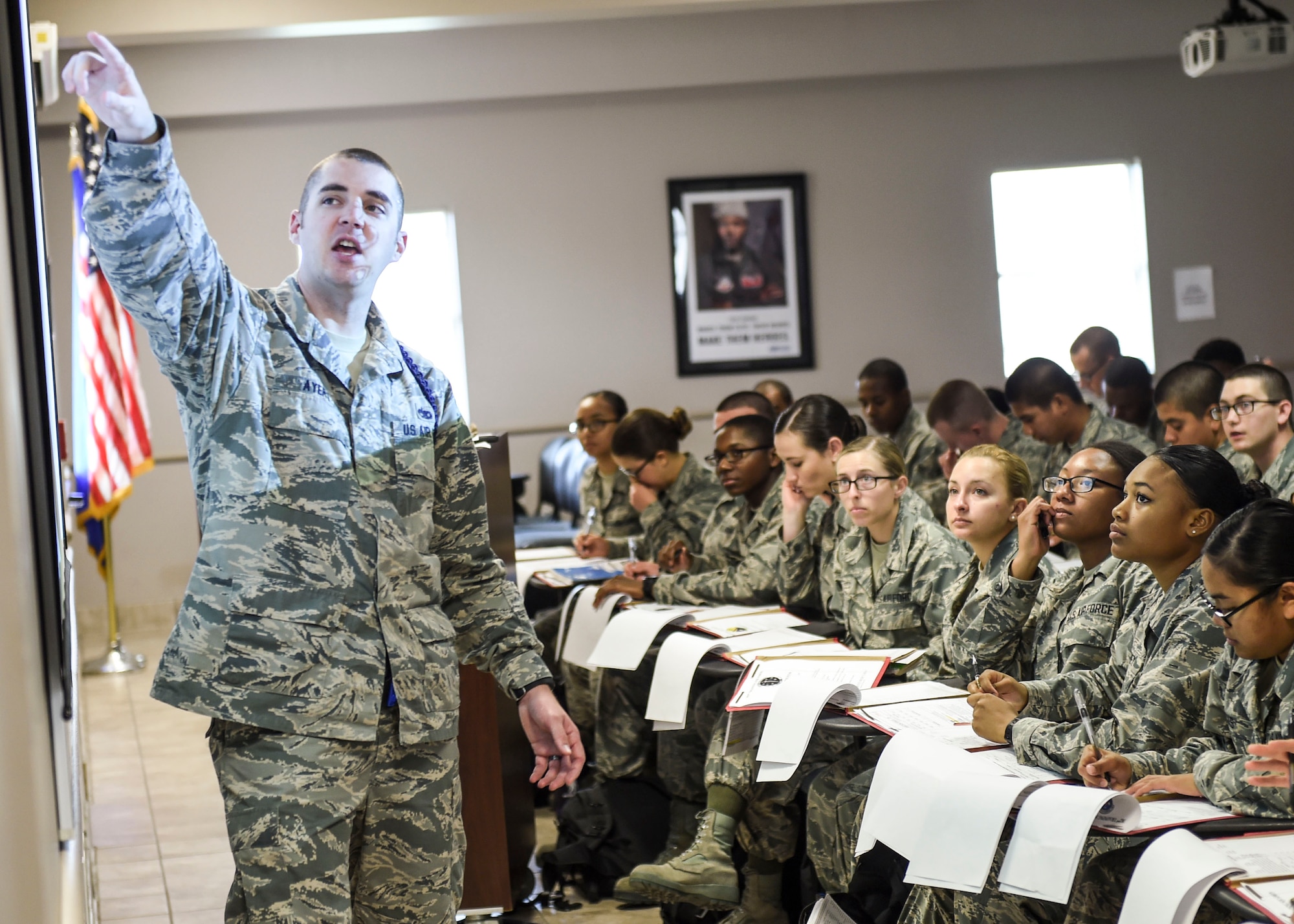 Staff Sgt. Joshua Ayers, 59th Training Group military training leader, gives an orientation briefing to new students April 14, 2016, on Joint Base San Antonio-Fort Sam Houston, Texas. The 59th TRG welcomes an average of 80 new technical training students every week. The group was activated on Jan. 4, 2016, when the 59th Medical Wing assumed command of the group from the 37th Training Wing. (U.S. Air Force photo/Staff Sgt. Michael Ellis)