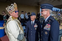Lt. Gen. Darryl Roberson, commander of Air Education and Training Command commander, and Brig. Gen. Bob LaBrutta, 502nd Air Base Wing commander, greet Darren Casey, 2016 El Rey Feo, before the Royal Review of the Air Force Basic Military Training graduation April 15, 2016, at Joint Base San Antonio-Lackland. The Royal Review is a military tradition dating back to at least 1950 that allows Fiesta Royalty, to include King Antonio and El Rey Feo, to tour JBSA-Lackland each April and attend a BMT graduation ceremony.
