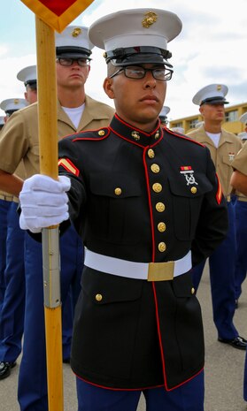 Private First Class Christian H. Gutierrez, Platoon 1013, Alpha Company, 1st Recruit Training Battalion, stands at parade rest prior to graduation at Marine Corps Recruit Depot San Diego, April 22. Gutierrez is a Burbank, Calif., native and was recruited out of Recruiting Station Los Angeles. Annually, more than 17,000 males recruited from the Western Recruiting Region are trained at MCRD San Diego.