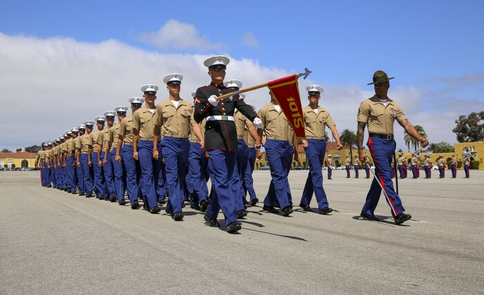 Marines from Alpha Company, 1st Recruit Training Battalion, march across the parade deck during a graduation ceremony at Marine Corps Recruit Depot San Diego, April 22. Graduation takes place at the completion of a 13-week transformation including training in drill, marksmanship, basic combat skills and Marine Corps customs and traditions. Annually, more than 17,000 males recruited from the Western Recruiting Region are trained at MCRD San Diego.