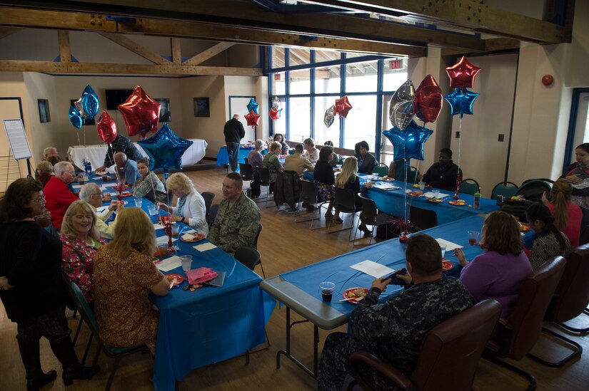 Joint Base Charleston leadership and community volunteers enjoy the food and fellowship during the volunteer appreciation luncheon April 15, 2016, at the Balfour Beatty Community Center on JB Charleston – Weapons Station, S.C. Participating in the event were members with Navy-Marine Corps Relief Society, Fleet and Family Support Center, American Red Cross and Navy Wives Club of America. During the luncheon, volunteers were presented with certificates of appreciation from special guests Col. Robert Lyman, JB Charleston commander and Navy Capt. Tim Sparks, JB Charleston deputy commander. (U.S. Air Force photo/Senior Airman Clayton Cupit)