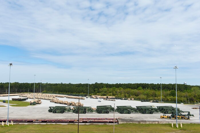 Equipment belonging to the Army awaits to be loaded aboard the U.S. Naval Ship Red Cloud, April 18, 2016, at Joint Base Charleston, S.C. – Weapons Station. Members from the Army Strategic Logistics Activity Charleston and the 841st Transportation Battalion staged, processed and configured 1,300 pieces of equipment to support USNS Red Cloud’s prepositioned ship mission. (U.S. Air Force photo/Staff Sgt. Jared Trimarchi)  
