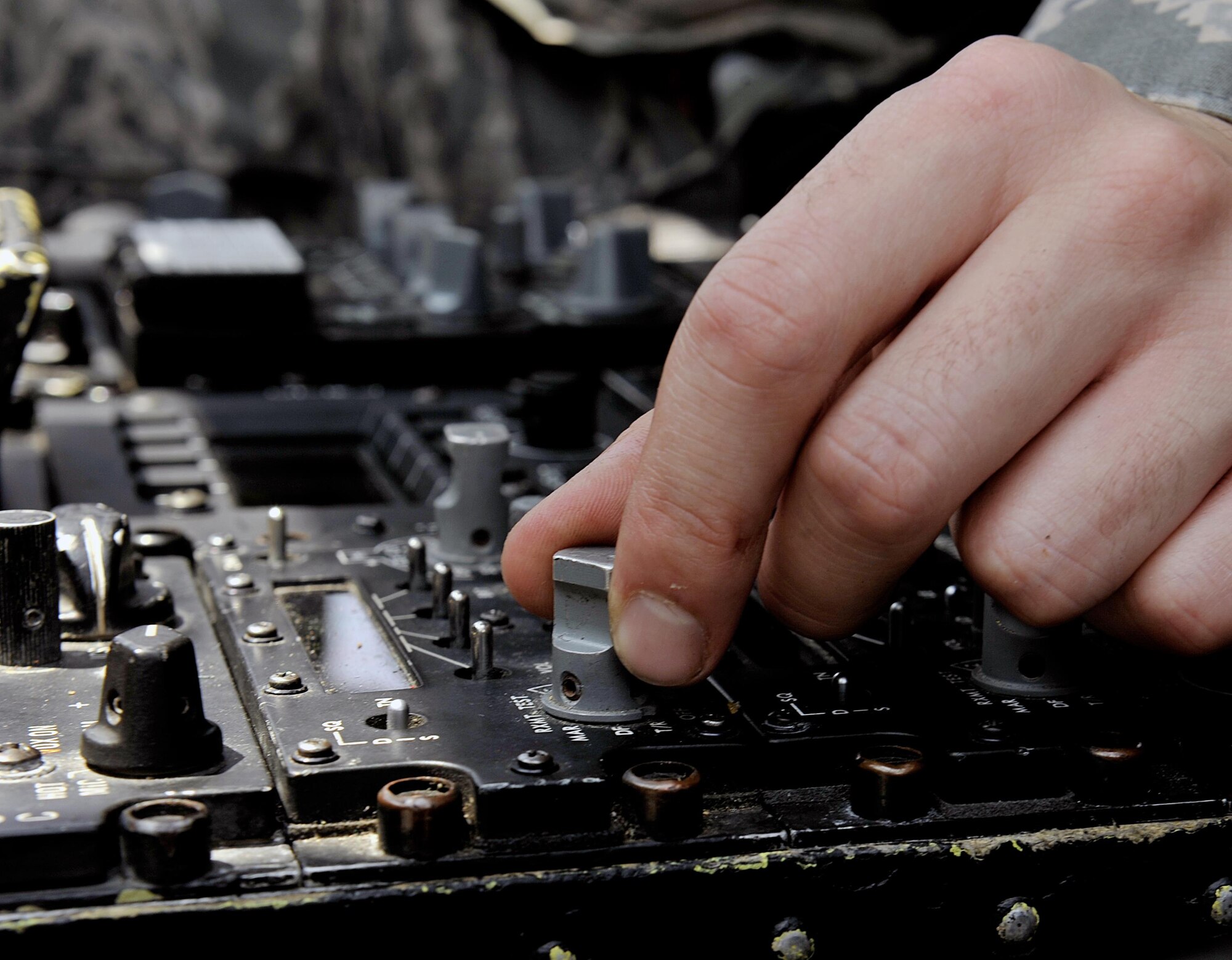 U.S. Air Force Airman 1st Class Ian Wilkerson, 718th Aircraft Maintenance Squadron communication navigation specialist, checks the radio systems of an HH-60G Pave Hawk helicopter during a pre-flight inspection, April 26, 2016, at Kadena Air Base, Japan. The 718th Aircraft Maintenance Squadron maintains military aircraft for flight to ensure safety and reliability in support of the training mission here at Kadena. (U.S. Air Force photo by Naoto Anazawa)