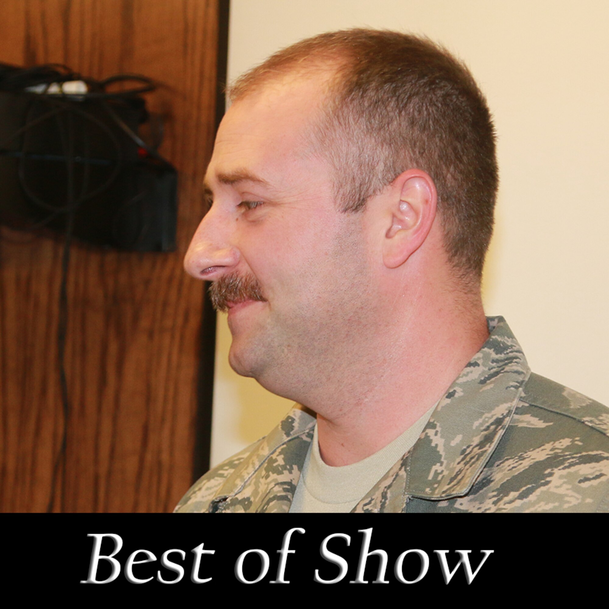 Senior Master Sgt. Collin Grandy, 173rd Fighter Wing Maintenance Group, was the top winner in the Kingsley Field Mustache March competition, taking the prize of Best of Show April 1, 2016.  Across the base member signed up to compete in a facial hair grown contest to raise money for the upcoming Combat Dining In function.  (U.S. Air National Guard photo by Master Sgt. Jennifer Shirar/released)