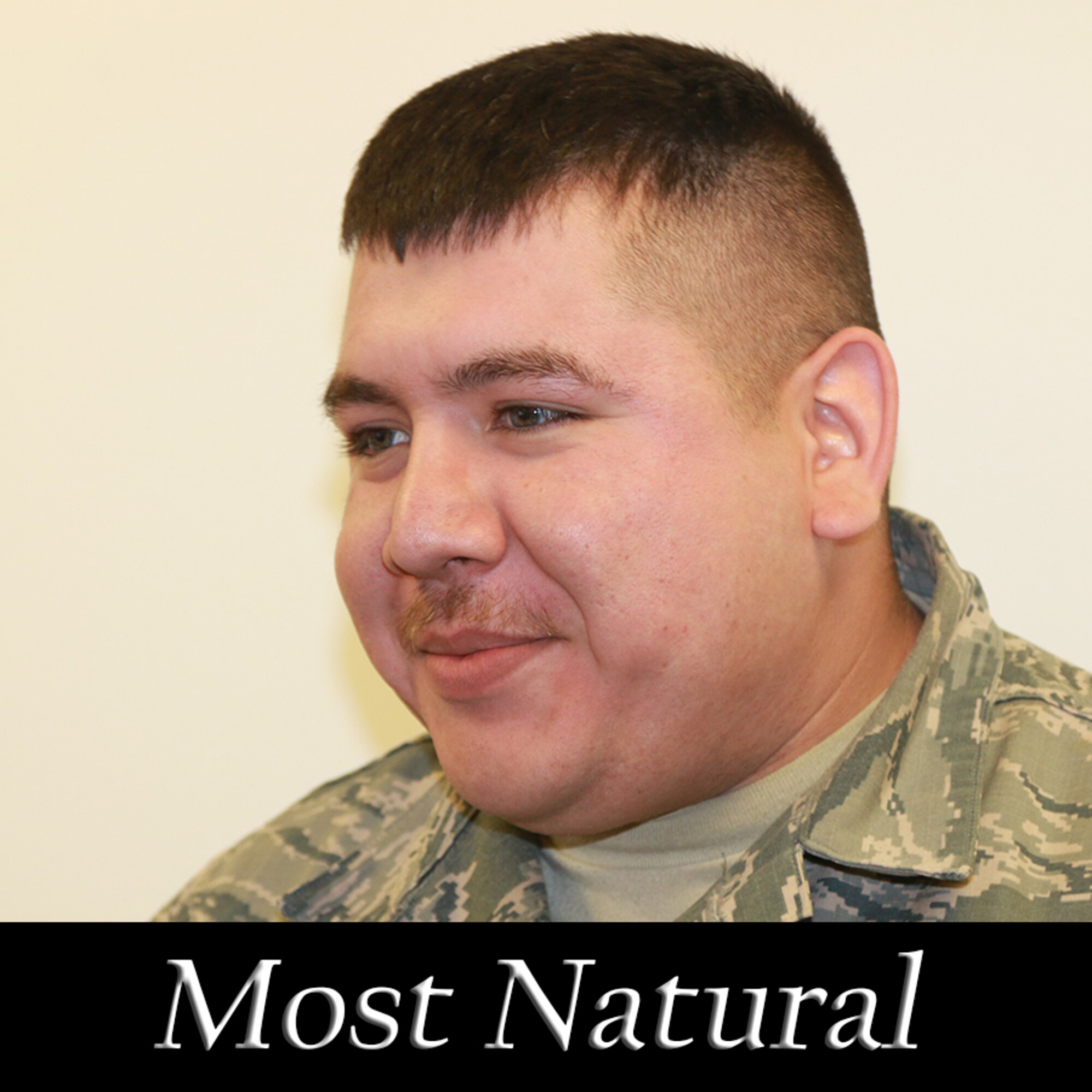 Senior Airman Manuel Hernandez, 173rd Fighter Wing Communications Flight, was awarded the Most Natural prize in the Kingsley Field Mustache March competition April 1, 2016.  Across the base member signed up to compete in a facial hair grown contest to raise money for the upcoming Combat Dining In function.  (U.S. Air National Guard photo by Master Sgt. Jennifer Shirar/released)