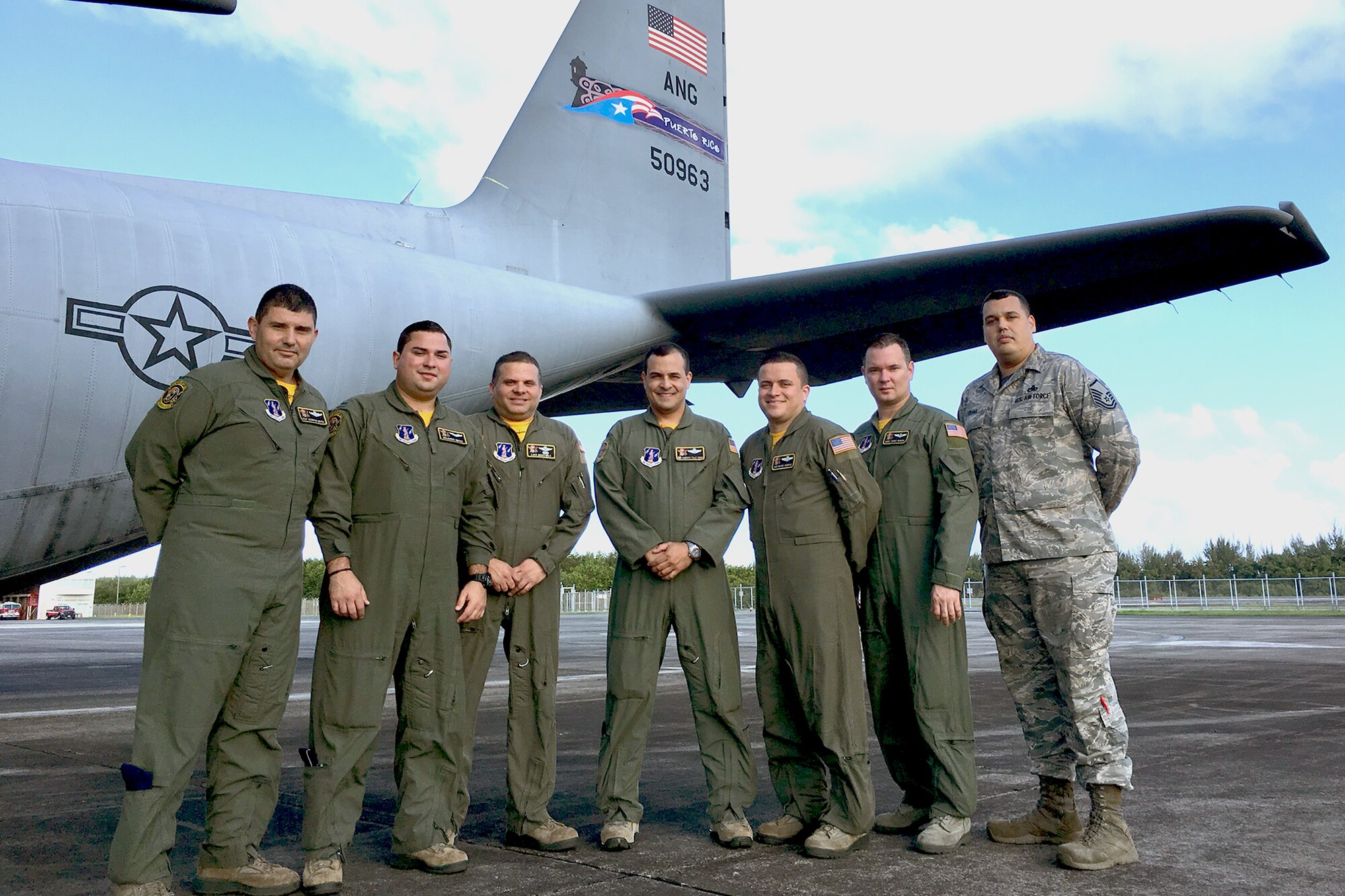 U.S. Air Force aircrew of the 156th Operations Group, Puerto Rico Air National Guard, receive recognition from Lt. Col. Tammy D. Pokorney, chief nurse of the 375th Aeromedical Evacuation Squadron, Scott Air Force Base, Illinois for excellent customer service and crew integrity during the PRANG's first east coast aeromedical evacuation mission on a WC-130 Hercules, April 2016.  The expeditious movement and professional teamwork of the PRANG aircrew with the 375th AE crew helped expedite the transportation of four patients to four separate locations ensuring mission effectiveness and success. (U.S. Air National Guard photo by Tech. Sgt. Jaime Torres-Urbina)