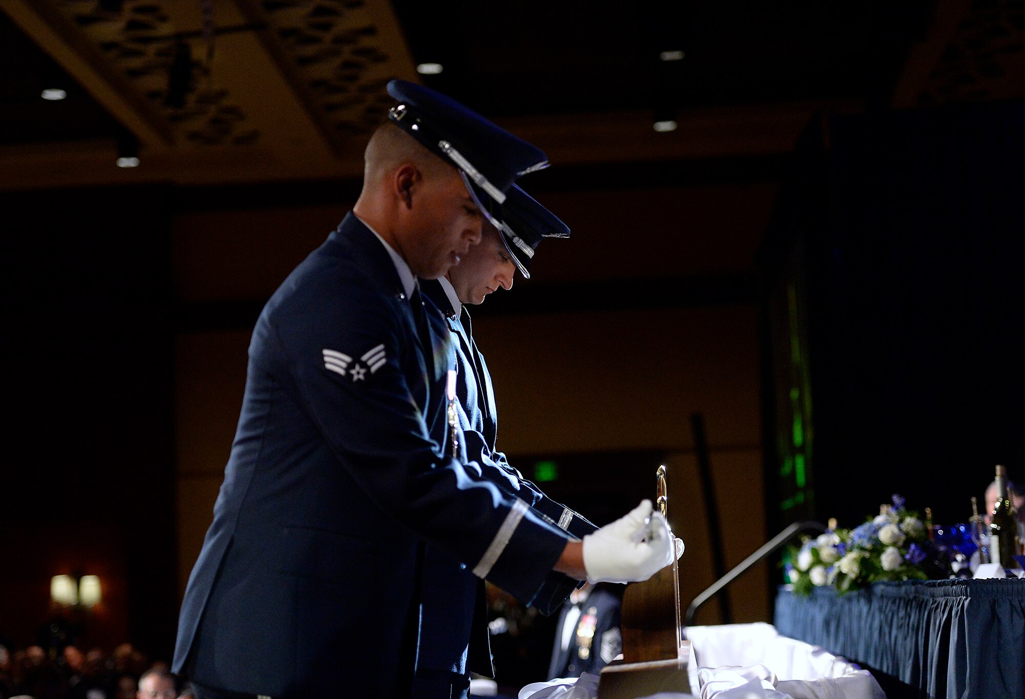 Two members of the U.S. Air Force Honor Guard secure the Order of the Sword display at the dining-in where Chief Master Sgt. of the Air Force James A. Cody bestowed Air Force Chief of Staff Gen. Mark A. Welsh III with the honor, April 22, 2016, Montgomery, Ala. (U.S. Air Force photo/Scott M. Ash)