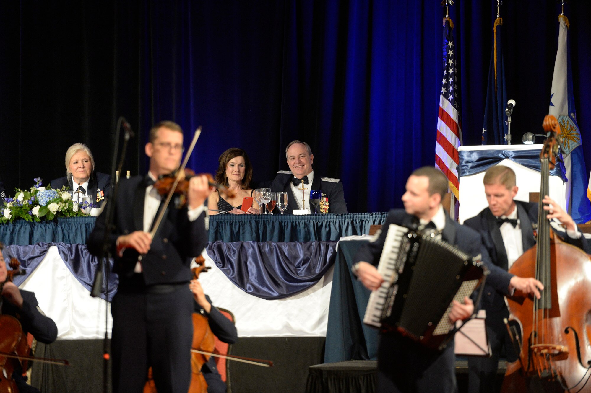 Air Force Chief of Staff, Gen. Mark A. Welsh III and his wife, Betty, enjoy a music performance by the Air Force Band’s Strolling Strings during the Order of the Sword presentation ceremony, April 22, 2016, Montgomery, Ala. The five hour event included a performance from the Air Force band as well as a drill demonstration from the Air Force Honor Guard in honor of Welsh. (U.S. Air Force photo/Scott M. Ash)
