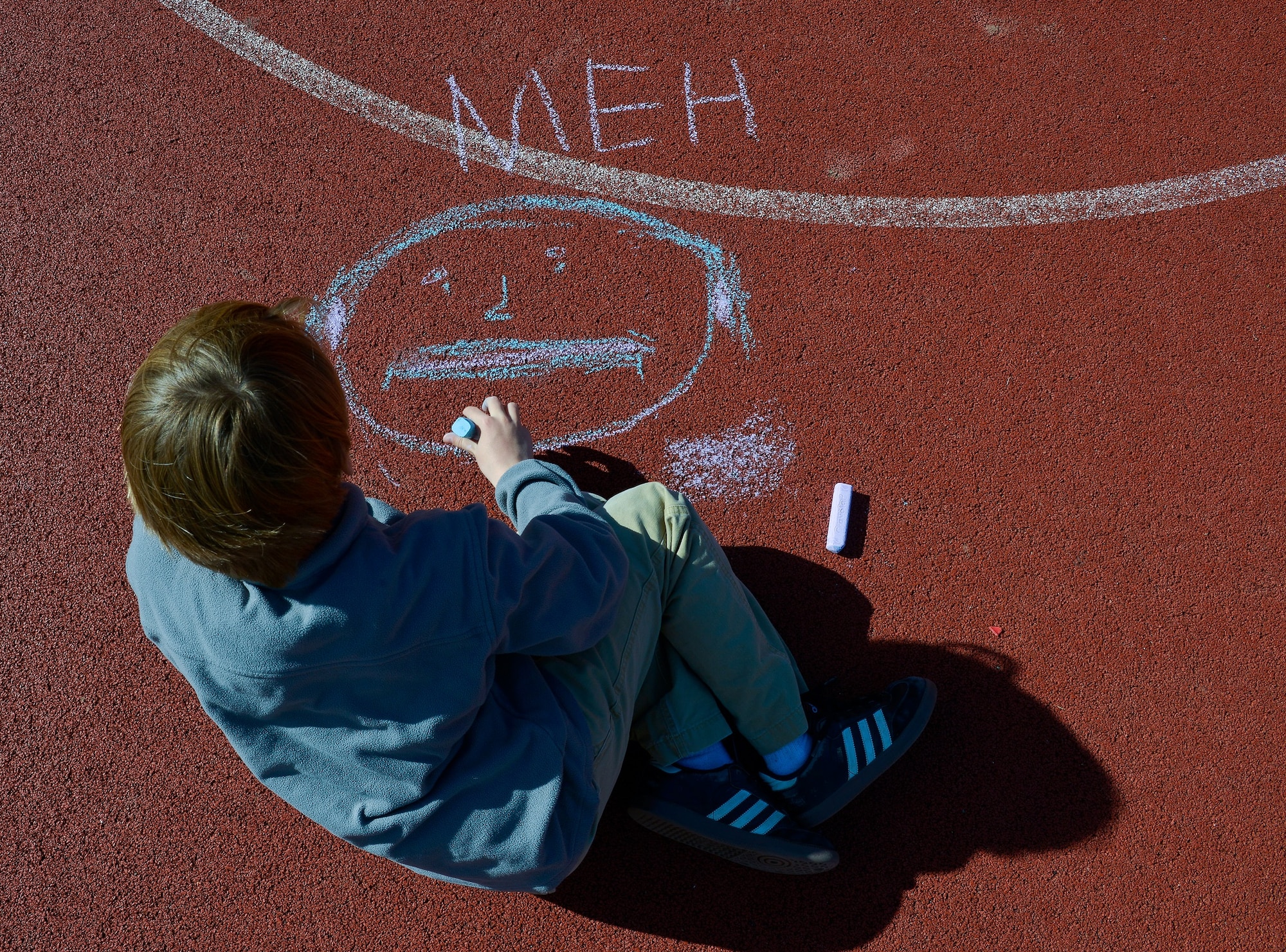 A child at Vogelweh Elementary School draws out his emotions at the time during a therapy session April 21, 2016, at Vogelweh Air Base, Germany. Students who were separated from their parents during the Turkey evacuation and transitioned to Vogelweh schools undergo therapy to help them cope with stress and anxiety issues they may have. (U.S. Air force photo/Airman 1st Class Lane T. Plummer)