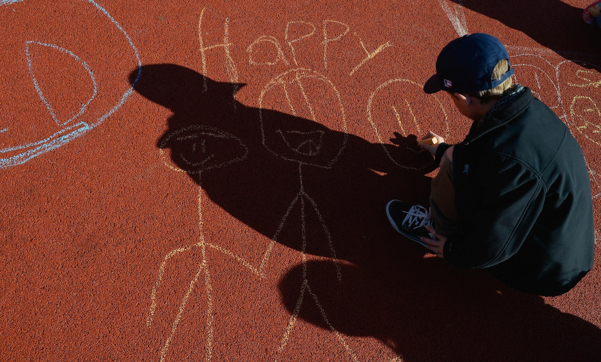 Children from Vogelweh Elementary School draw out their emotions during a therapy session April 21, 2016, at Vogelweh Military Complex, Germany. Children at the school who arrived after being separated from family serving in Turkey are cared for by guidance counselors who help ease their stress and anxieties. (U.S. Air force photo/Airman 1st Class Lane T. Plummer)