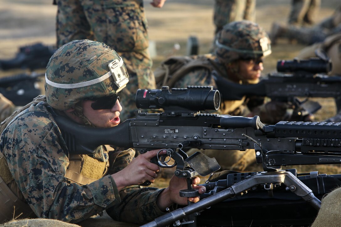 U.S. Marines with Black Sea Rotational Force fire M240B light machine guns during a live-fire exercise to confirm their zero aboard Mihail Kognalniceanu Air Base, Romania, Feb. 2, 2016. Marines from 1st Battalion, 8th Marine Regiment, conducted battle sight zeroes on various individual weapons systems, to prepare for future BSRF exercises and contingencies. (U.S. Marine Corps photo by Cpl. Kelly L. Street, 2D MARDIV COMCAM/Released)