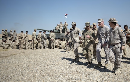 Marine Corps Gen. Joe Dunford, chairman of the Joint Chiefs of Staff, meets with trainers assigned to Combined Joint Task Force Operation Inherent Resolve at Besmaya Range Complex in Iraq, April 21, 2016. There are 3,782 Iraqi and peshmerga soldiers being trained at five sites across Iraq. Trainers come from the United States, Australia, Denmark, Finland, France, Germany, Hungary, Italy, Latvia, the Netherlands, New Zealand, Norway, Portugal, Spain and the United Kingdom. DoD Photo by Navy Petty Officer 2nd Class Dominique A. Pineiro