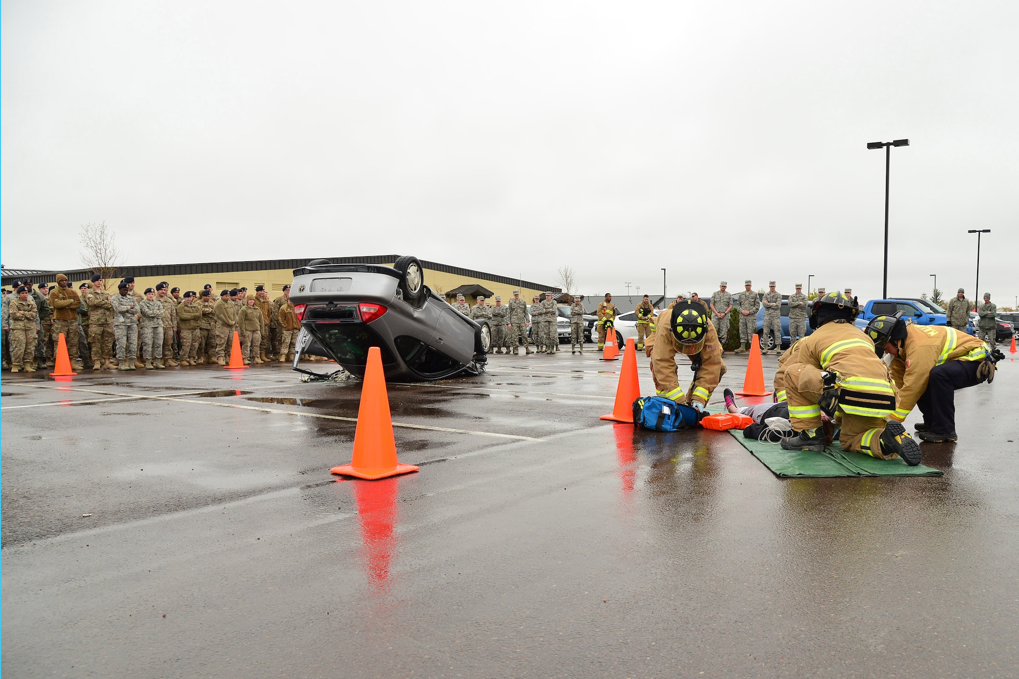First responder personnel assigned to the 341st Missile Wing participate in a Live or Die demonstration, simulating possible consequences of a drunk driving situation April 25, 2016, at Malmstrom Air Force Base, Mont. The base hosted the event as part of the Drink Smart campaign which addresses making good choices when consuming alcohol. (U.S. Air Force photo/Airman Daniel Brosam) 