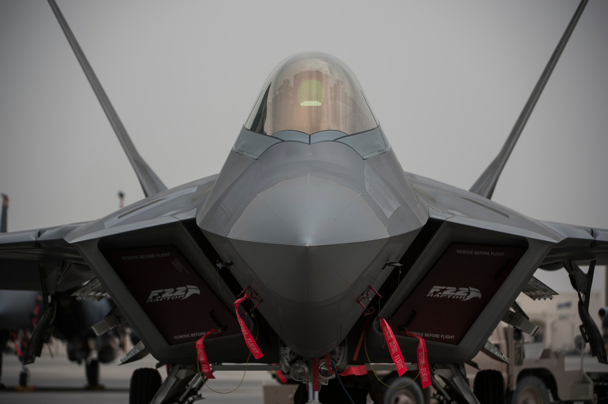 380th Air Expeditionary Wing Airmen download weapons from an F-22A Raptor at an undisclosed location in Southwest Asia April 14, 2016. The current group of Raptors employs the most up-to-date software and hardware package, allowing it to carry a wider range of munitions. (U.S. Air Force Photo by Staff Sgt. Chad Warren/Released)
