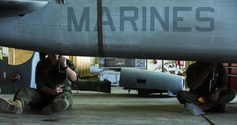 Aircraft maintenance Marines perform daily maintenance on a UH-1Y Huey, April 8, 2016, at Marine Corps Air Station Futenma, Okinawa, Japan. The maintainers work in shifts so that each squadron maintains a 24-hour presence at its hangar. The Marines are with Marine Light Attack Helicopter Squadron 167, currently supporting Marine Aircraft Group 36, 1st Marine Aircraft Wing, III Marine Expeditionary Force, under the unit deployment program. 