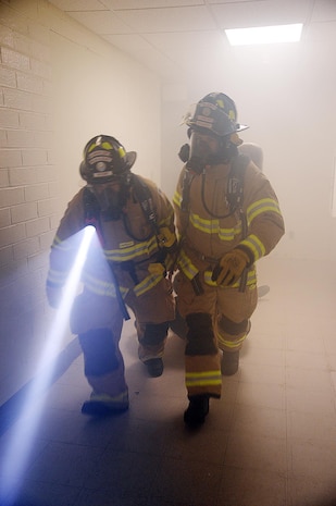 Marine Corps Logistics Base Albany firefighters conduct a search and rescue operation during Exercise Black Swan 2016, here, April 12.