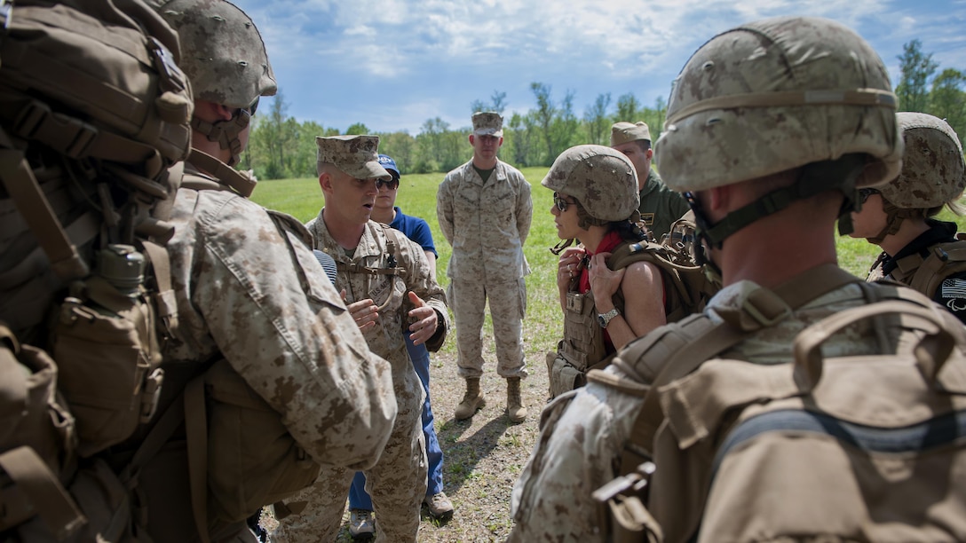 United States Marine Corps Maj. George J. Flynn, director of the Infantry Officer Course, provides Under Secretary of the Navy Dr. Janine Davidson a brief on the IOC hike progression program and the various combat loads used in each phase of training at The Basic School, at Marine Corps Base Quantico, Virginia, April 26, 2016. Davidson met with Marine Corps Combat Development Command leadership and Marines at TBS to better understand how the service trains, educates and equips its force.
