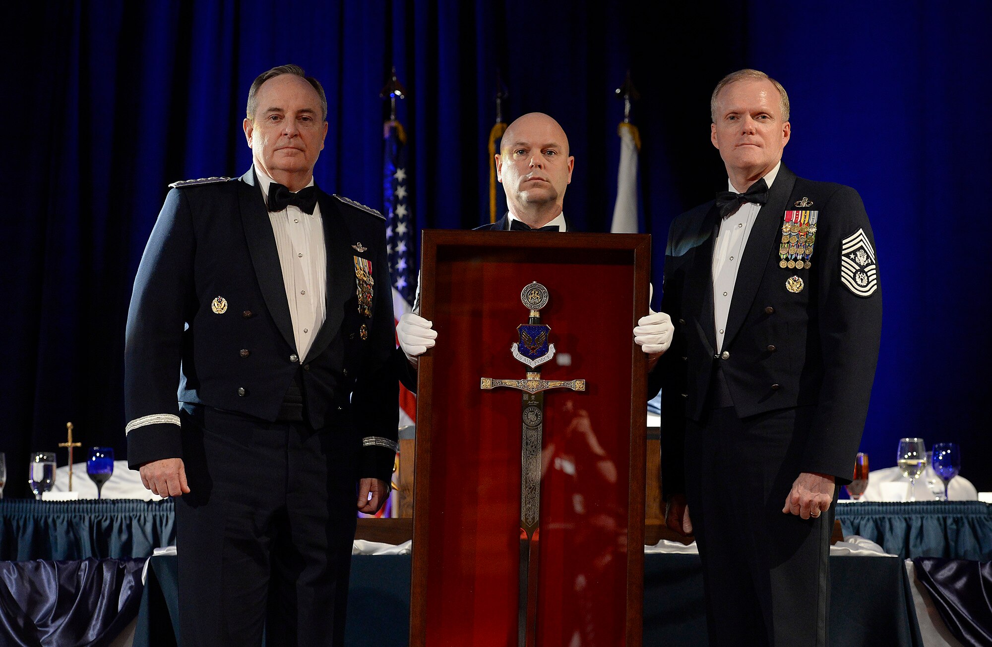 Air Force Chief of Staff Gen. Mark A. Welsh III thanks Chief Master Sgt. of the Air Force James A. Cody and members of the mess during the Order of the Sword dining-in, April 22, 2016, in Montgomery, Ala. The Order of the Sword is bestowed to those who have made significant contributions to the Air Force enlisted corps, and during his speech Welsh shared experiences in his career that shaped his opinion of the enlisted corps. (U.S. Air Force photo/Scott M. Ash)