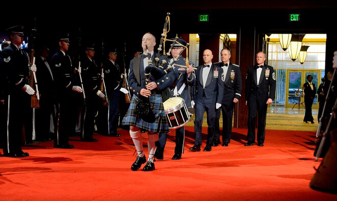 Chief Master Sgt. of the Air Force James A. Cody ushers in Air Force Chief of Staff Gen. Mark A. Welsh III at the Order of the Sword dining-in April 22, 2016, in Montgomery, Ala. (U.S. Air Force photo/Scott M. Ash)