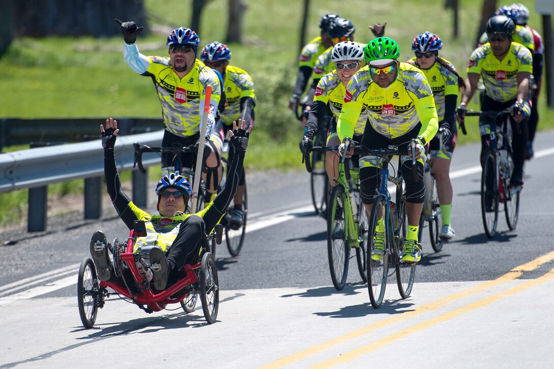 Retired Army Sgt. Albert Gonzalez sets pace for the Rescue 22 team during the Face of America bike ride in Gettysburg, Pa., April 24, 2016. More than 150 disabled veteran cyclists were paired amongst 600 able-bodied cyclists to ride 110 miles from Arlington, Va., to Gettysburg over two days in honor of veterans and military members. DoD photo by EJ Hersom