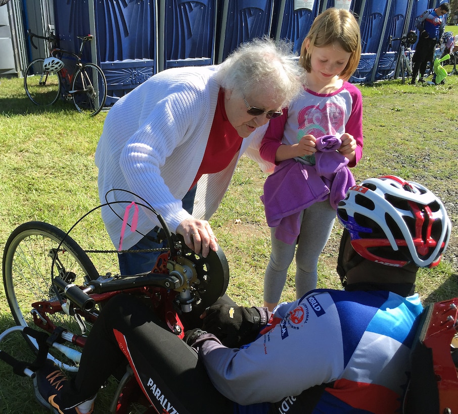 Virginia Wantz and her granddaughter, Autumn Schaffer, thank medically retired Army Sgt. 1st Class Carl Morgan for his military service at a rest stop in Pennsylvania during the World T.E.A.M.'s Face of America ride, April 24, 2016. More than 700 cyclists, 175 of them disabled veterans, rode 110 to 120 miles from either Arlington, Va., or Valley Forge, Pa., to Gettysburg over two days. DoD photo by Shannon Collins