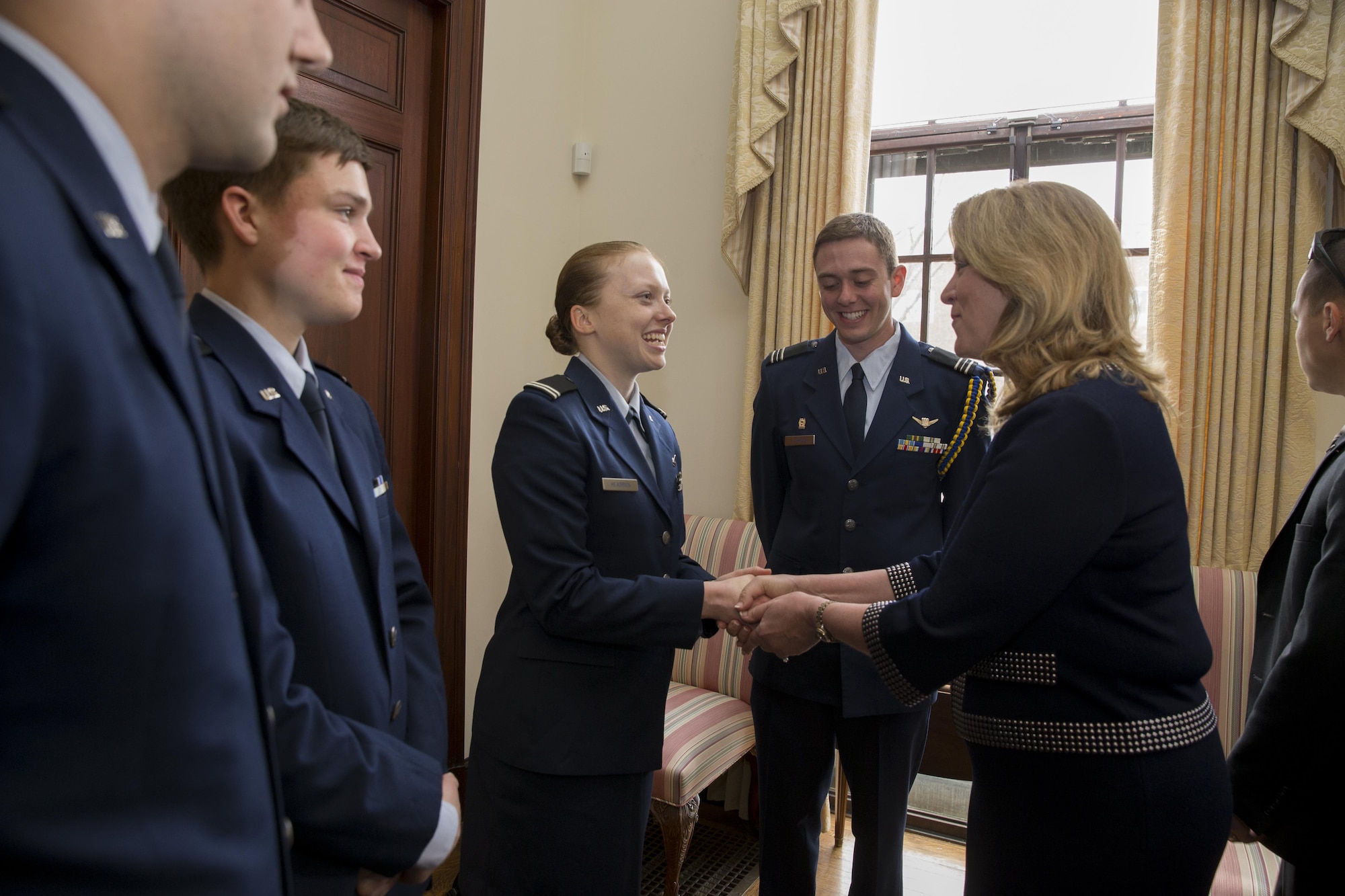 Air Force Secretary Deborah Lee James greets Air Force ROTC cadets at Harvard University in Cambridge, Mass., after signing an agreement officially bringing the program back to the school April 22, 2016. This marks the first time the school has officially recognized the Air Force program since school officials stripped the program of its academic standing in 1971. (Photo courtesy of Harvard/Rose Lincoln) 