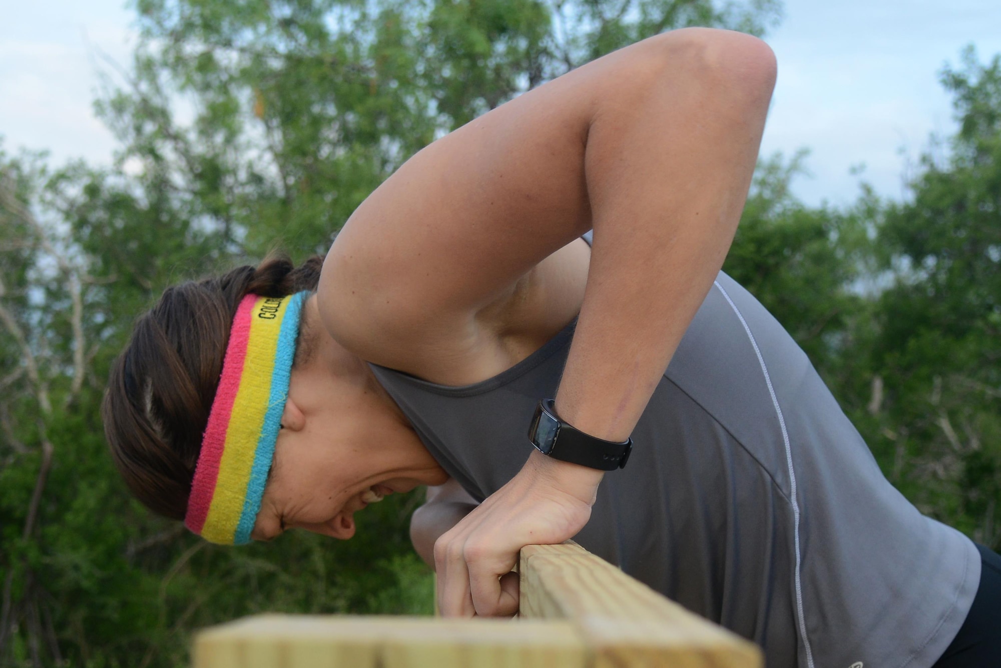Capt. Carly Reimer, 47th Civil Engineer Squadron engineering flight chief, climbs a six-foot-wall during Adventure Race XII, on Laughlin Air Force Base, Texas, April 23, 2016. The wall climb was one of three obstactles the runners encontered during the 28-mile race that involved running, biking and boating. Reimer placed 3rd overall in the “Insane” category, completing all activities alone in two hours, one minute and 56 seconds. (U.S. Air Force photo by Airman 1st Class Brandon May)