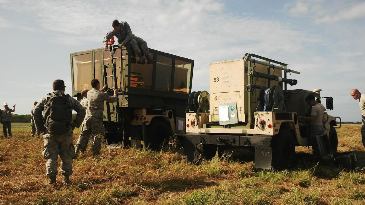 A U.S. Air Force team sets up a mobile air traffic control tower at Eloy Alfaro International Airport in Manta, Ecuador, April 26, 2016. The portable tower will help local controllers increase the flow of humanitarian aid entering the country. The United States, in coordination with the Ecuadorian government, deployed 12 Air Force airmen to Ecuador to support international relief efforts for victims of a 7.8-magnitude earthquake. Photo courtesy of U.S. Embassy Quito