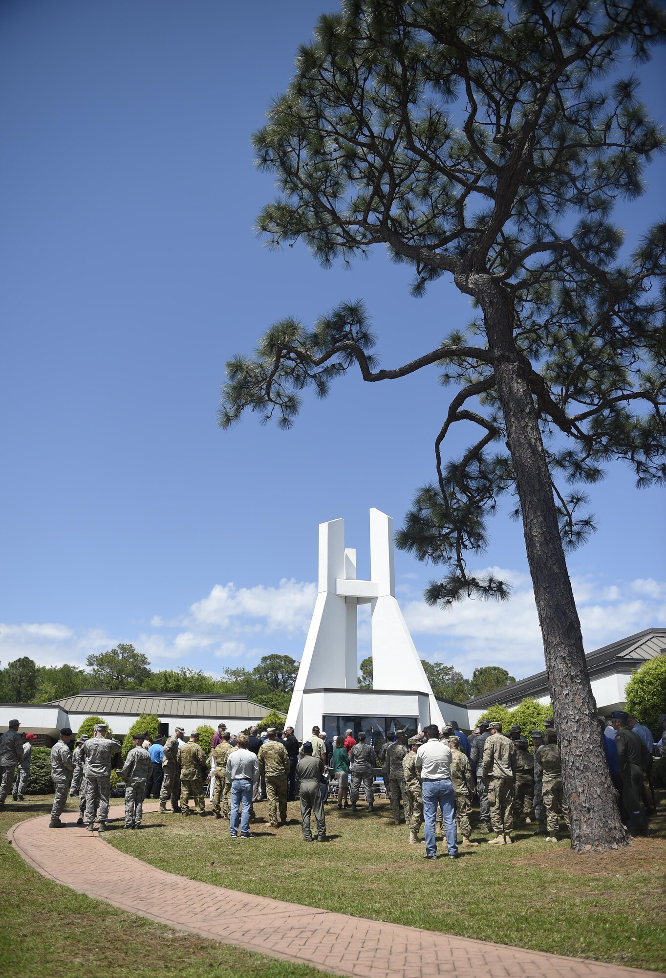 Airmen and families gather to remember Operation Eagle Claw on its 36th anniversary at Hurlburt Field, Fla., April 25, 2016. The attempted joint-services mission was conducted April 24, 1980, to rescue Americans being held hostage by a mob in Tehran, Iran, since Nov. 4, 1979. The failure of the services to work cohesively lead to the establishment of United States Special Operations Command on April 16, 1987. (U.S. Air Force photo Airman 1st Class Kai White)